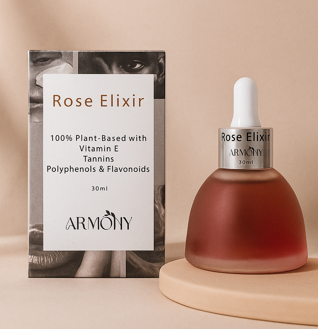 Rose Elixir dropper bottle with packaging on a beige background