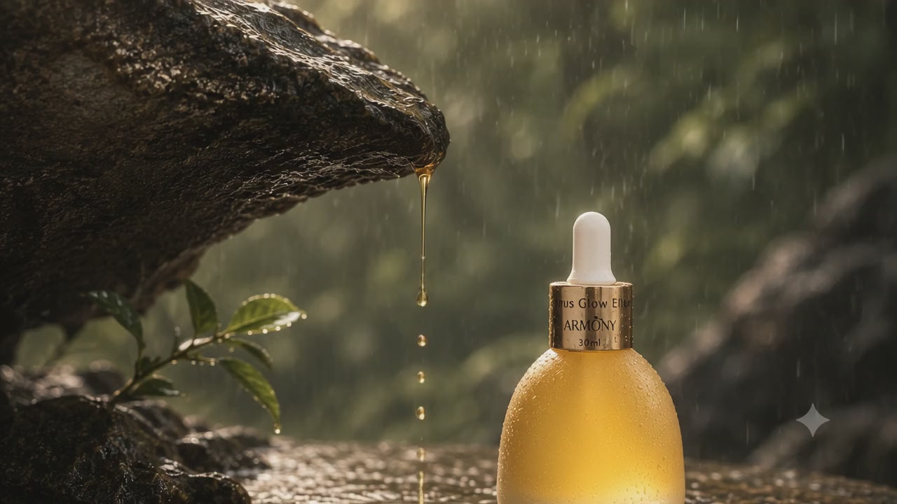 Armony Citrus glow elixir in a rainy outdoor setting. Oil texture showing